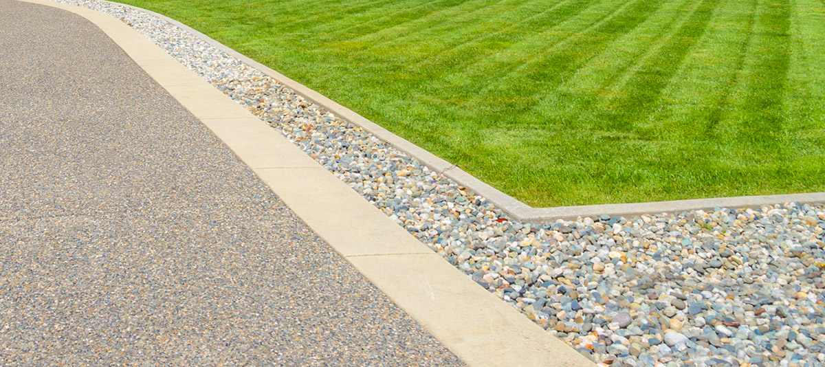 An Attentively-Trimmed Lawn and Driveway
